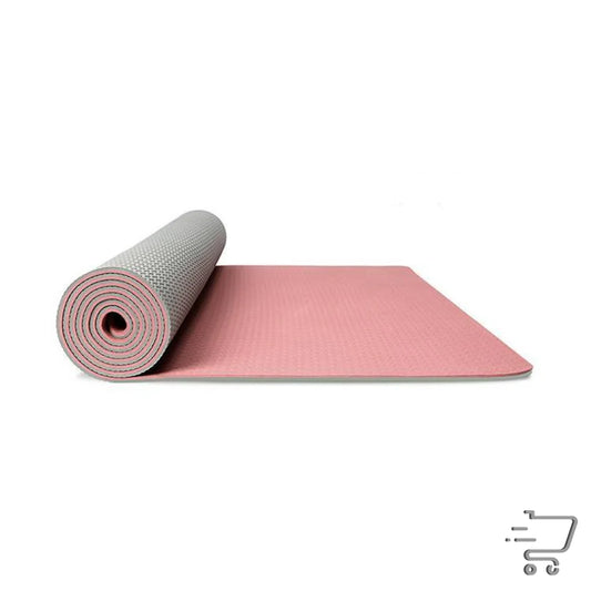 Pink yoga mat partially rolled up revealing gray underside next to Eco-Friendly Yoga Towel 183cm x 61cm