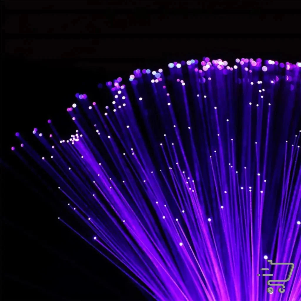 Bundle of illuminated purple fiber optic strands creating vibrant lighting magic