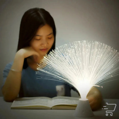 Fiber optic lamp radiating colorful light strands for enchanting home decor