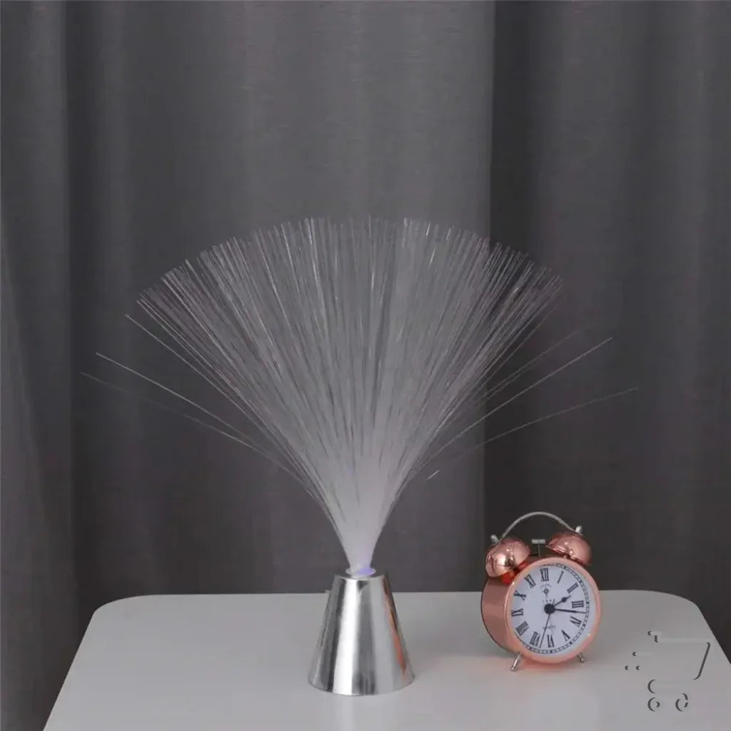 Fiber optic lamp with vibrant strands glowing in a fan shape for enchanting lighting