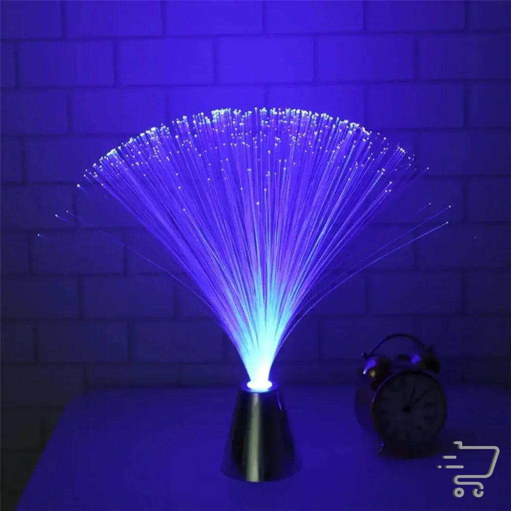 Fiber optic lamp radiating vibrant blue light in a fan-like pattern for enchanting decor