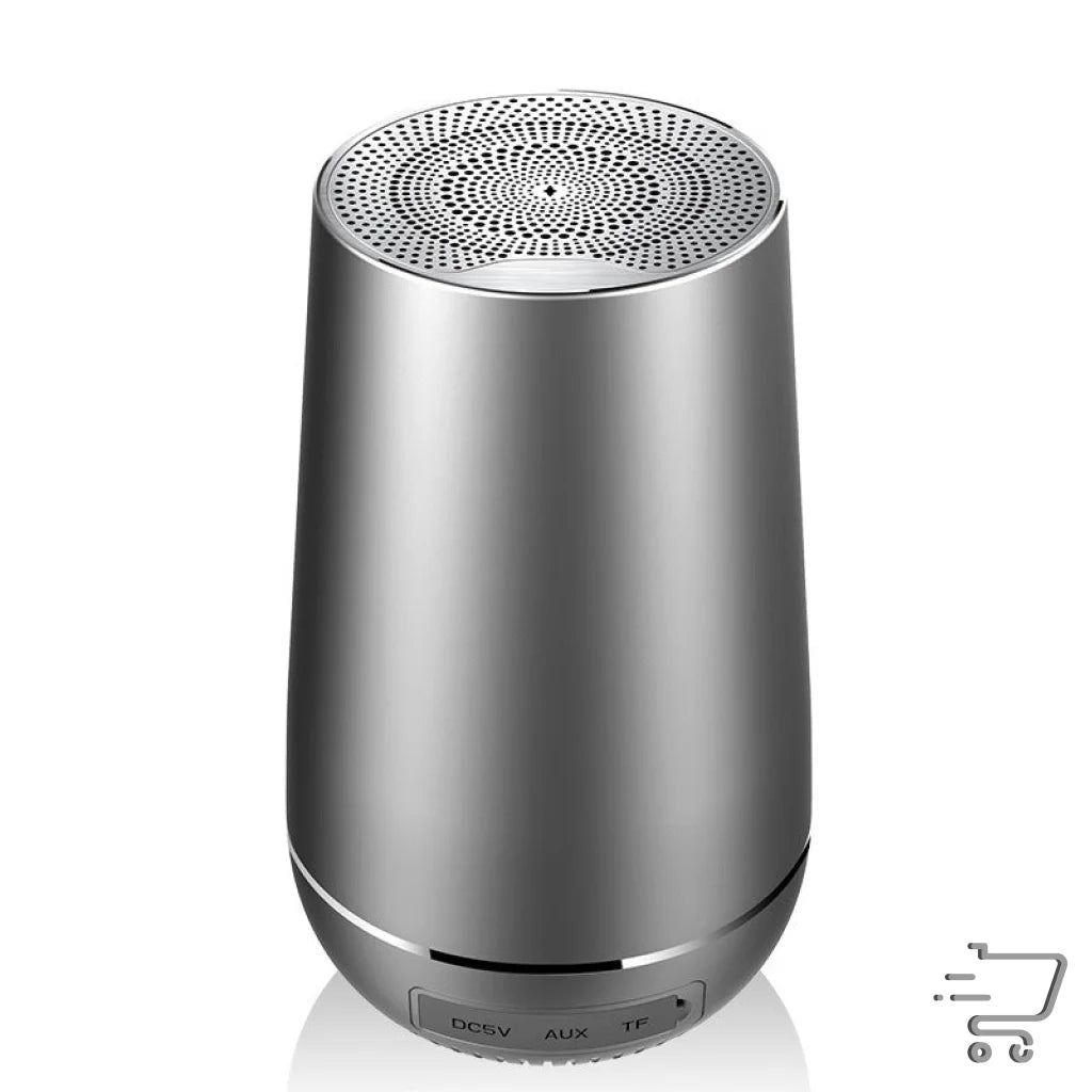 Cylindrical silver Bluetooth speaker for the Ultimate USB Charger and Aux Audio Hub